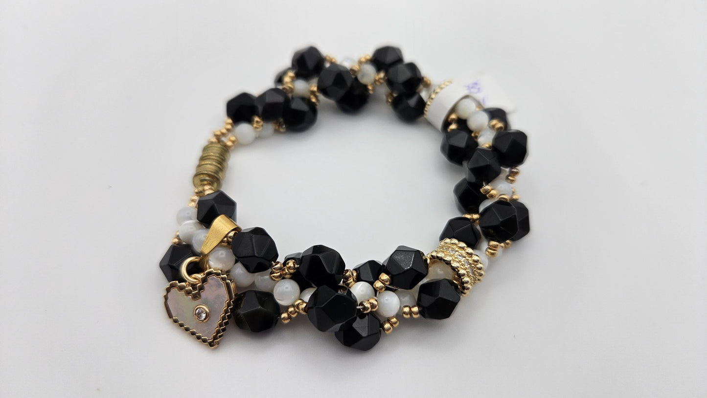 Black and white magnetic clasp bracelet for women size 6. Handmade with natural materials and gold accents. Heart charm. Obsidian and Shell