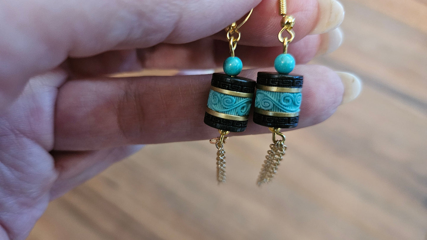Turquoise necklace and earing set, 24 inch, gold tone chain with tassle and black barrel charms. One of a kind, handmade.