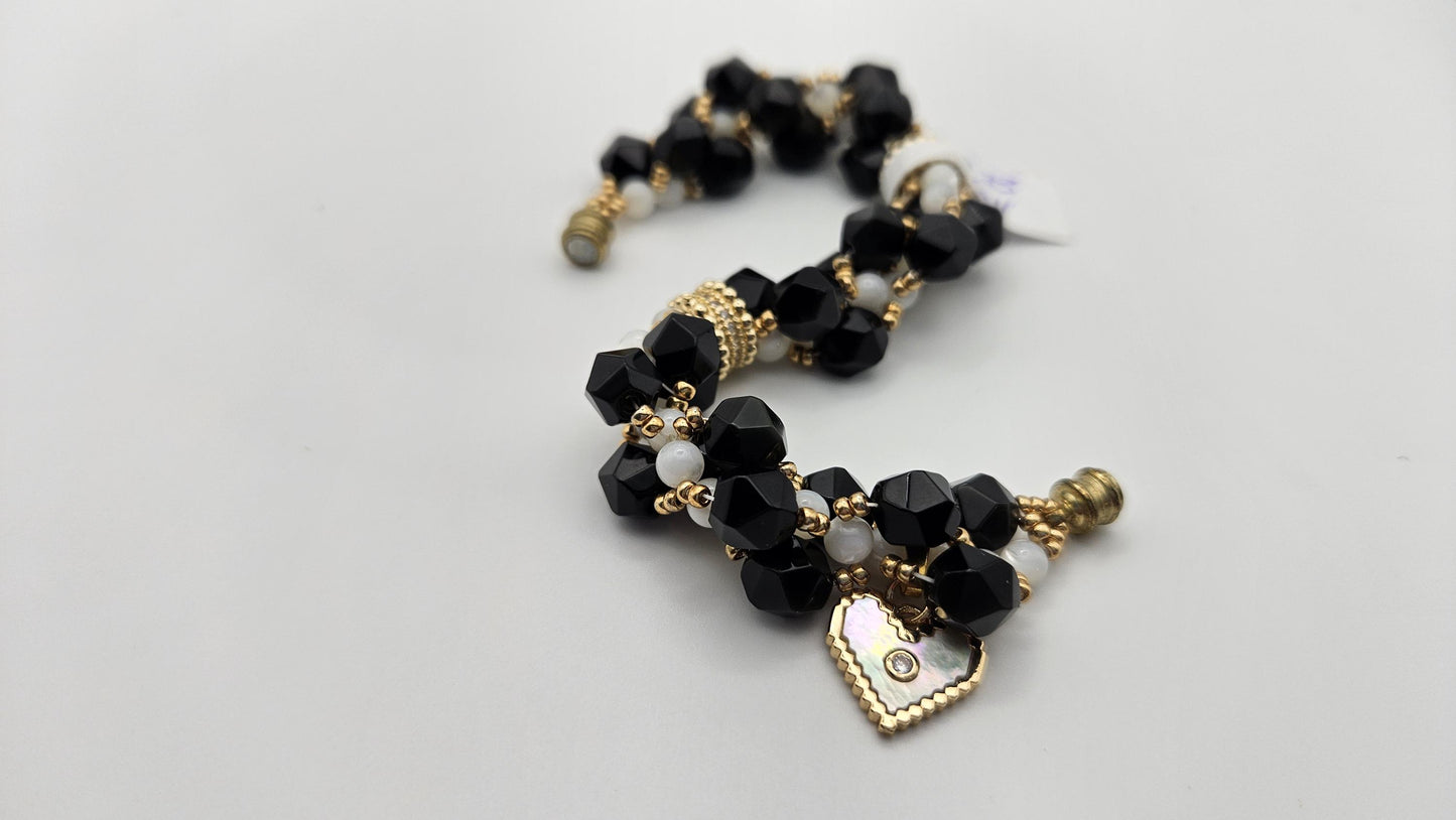 Black and white magnetic clasp bracelet for women size 6. Handmade with natural materials and gold accents. Heart charm. Obsidian and Shell