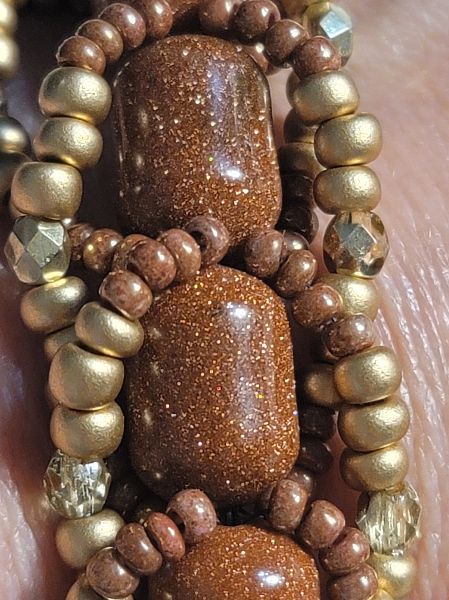 Chunky gold sandstone bracelet bead weaving with adjustable closure.
